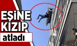 Eşine kızıp damdan atladı! Komşusunun üzerine düştü