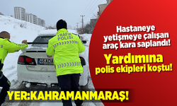 Kahramanmaraş'ta hastaneye yetiştirilmek isterken kara saplanan  aracın yardımına polisler koştu!