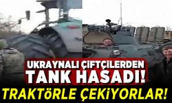 Ukraynalı çiftçilerden tank hasadı! Traktörle çekiyorlar!