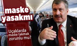 Uçaklarda maske takmak zorunlu mu? Sağlık Bakanı Koca açıkladı