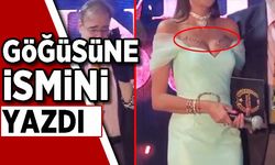 Sen misin dekolteyi eleştiren: Ulusoy'un göğüs belgesine MHP'li eski vekil Ahmet Çakar'ın ismi yazıldı