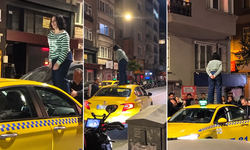 Şişli'de Taksiciyle Tartışan Kadın Aracın Üstüne Çıktı